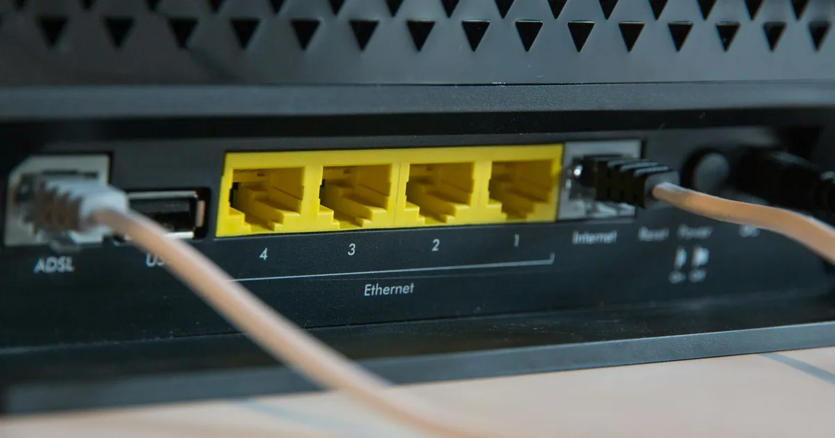 Ethernet cables plugged into the back of a home router — ViviMate troubleshooting